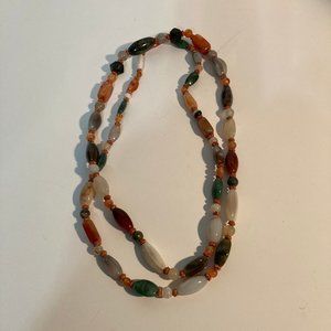 Statement necklace with multiple colored stones 24 inches